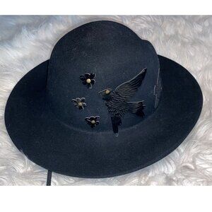 Hat with bird and flower patches by Giovannio New York